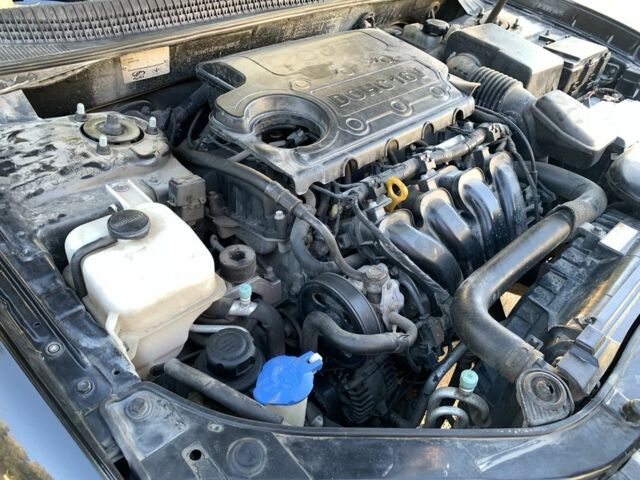 Черный Хендай Соната, объемом двигателя 2 л и пробегом 250 тыс. км за 6300 $, фото 16 на Automoto.ua