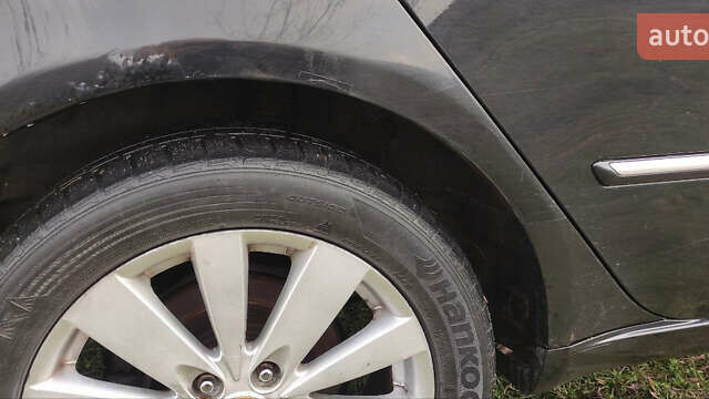 Черный Хендай Соната, объемом двигателя 2.4 л и пробегом 275 тыс. км за 6000 $, фото 10 на Automoto.ua