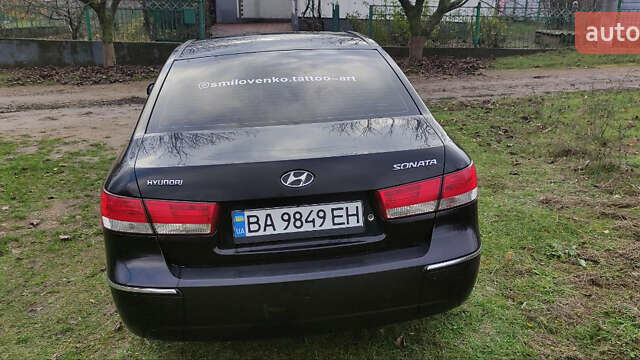 Черный Хендай Соната, объемом двигателя 2.4 л и пробегом 275 тыс. км за 6000 $, фото 11 на Automoto.ua