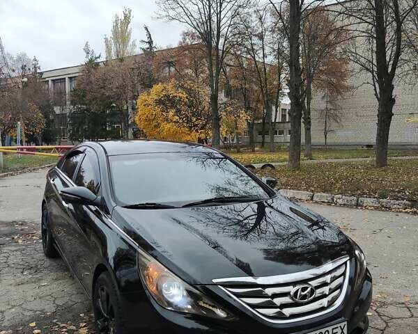Черный Хендай Соната, объемом двигателя 2 л и пробегом 216 тыс. км за 7499 $, фото 1 на Automoto.ua