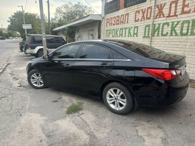 Черный Хендай Соната, объемом двигателя 2 л и пробегом 170 тыс. км за 6100 $, фото 1 на Automoto.ua