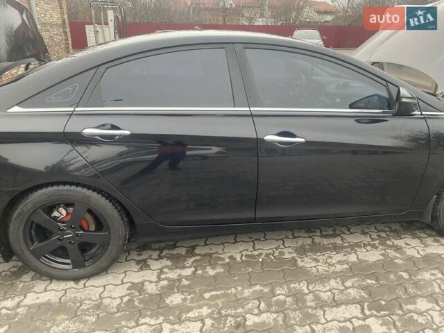 Черный Хендай Соната, объемом двигателя 2.4 л и пробегом 97 тыс. км за 10700 $, фото 5 на Automoto.ua