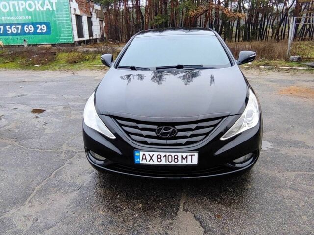 Черный Хендай Соната, объемом двигателя 2 л и пробегом 292 тыс. км за 7000 $, фото 1 на Automoto.ua