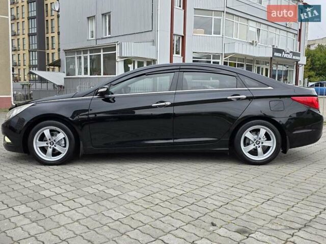 Чорний Хендай Соната, об'ємом двигуна 2.4 л та пробігом 193 тис. км за 7999 $, фото 9 на Automoto.ua