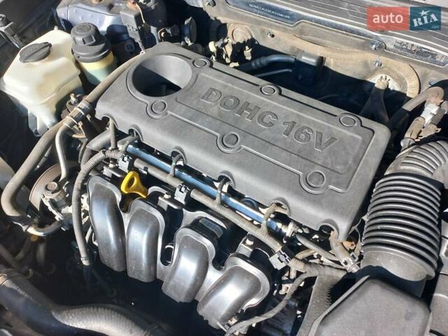 Черный Хендай Соната, объемом двигателя 2.36 л и пробегом 118 тыс. км за 9600 $, фото 87 на Automoto.ua