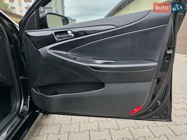 Чорний Хендай Соната, об'ємом двигуна 2.4 л та пробігом 193 тис. км за 7999 $, фото 48 на Automoto.ua