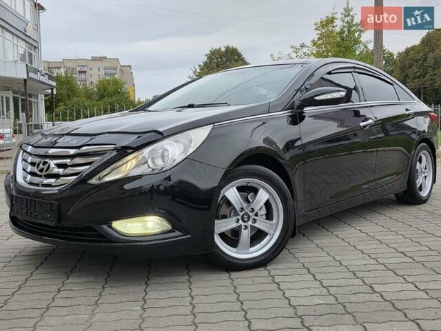 Чорний Хендай Соната, об'ємом двигуна 2.4 л та пробігом 193 тис. км за 7999 $, фото 1 на Automoto.ua
