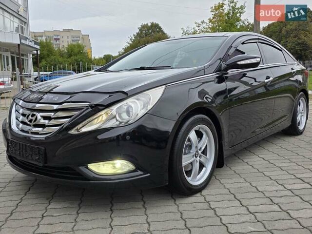 Чорний Хендай Соната, об'ємом двигуна 2.4 л та пробігом 193 тис. км за 7999 $, фото 6 на Automoto.ua