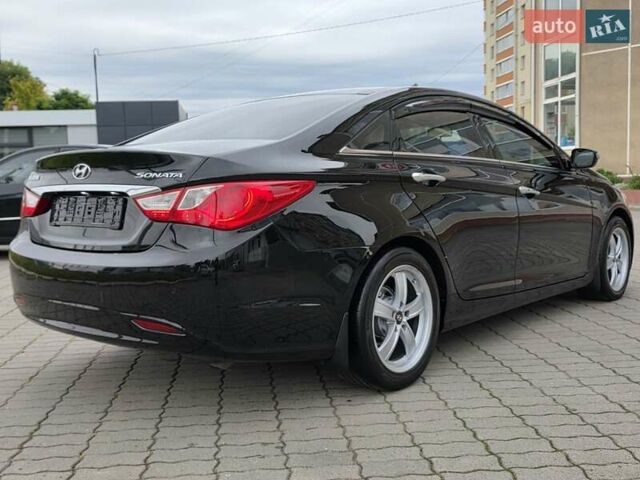 Чорний Хендай Соната, об'ємом двигуна 2.4 л та пробігом 193 тис. км за 7999 $, фото 3 на Automoto.ua