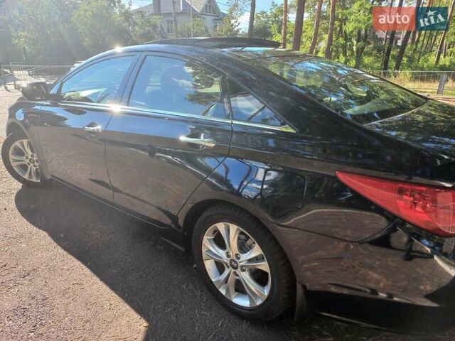 Черный Хендай Соната, объемом двигателя 2.36 л и пробегом 118 тыс. км за 9600 $, фото 113 на Automoto.ua