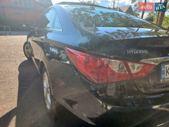 Черный Хендай Соната, объемом двигателя 2.36 л и пробегом 118 тыс. км за 9600 $, фото 123 на Automoto.ua