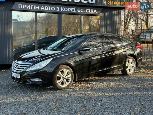 Чорний Хендай Соната, об'ємом двигуна 2.36 л та пробігом 260 тис. км за 8700 $, фото 1 на Automoto.ua