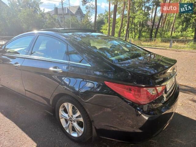 Черный Хендай Соната, объемом двигателя 2.36 л и пробегом 118 тыс. км за 9600 $, фото 103 на Automoto.ua