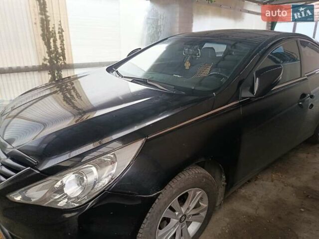 Черный Хендай Соната, объемом двигателя 2 л и пробегом 166 тыс. км за 9500 $, фото 1 на Automoto.ua