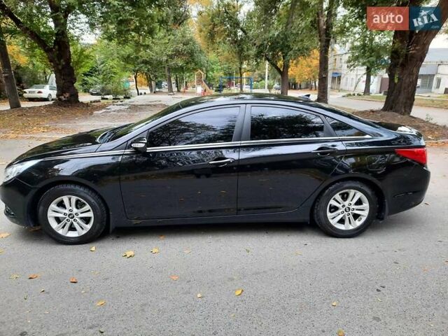 Чорний Хендай Соната, об'ємом двигуна 2.4 л та пробігом 185 тис. км за 8999 $, фото 4 на Automoto.ua
