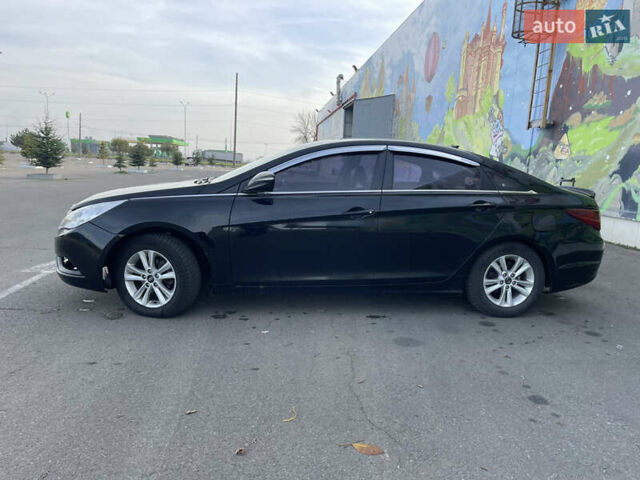 Черный Хендай Соната, объемом двигателя 2 л и пробегом 200 тыс. км за 6800 $, фото 2 на Automoto.ua