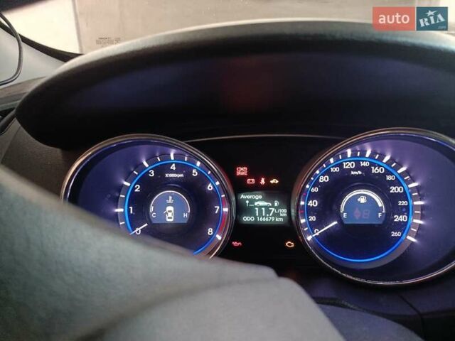 Черный Хендай Соната, объемом двигателя 2 л и пробегом 166 тыс. км за 9500 $, фото 6 на Automoto.ua