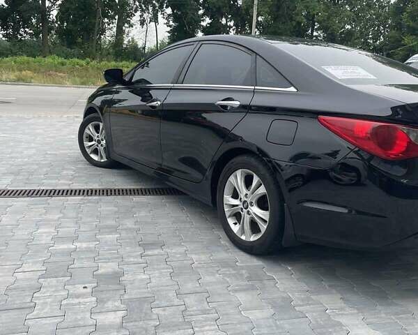 Черный Хендай Соната, объемом двигателя 2.36 л и пробегом 180 тыс. км за 8700 $, фото 4 на Automoto.ua