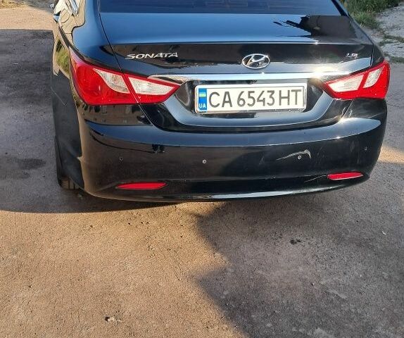 Черный Хендай Соната, объемом двигателя 2 л и пробегом 170 тыс. км за 7730 $, фото 1 на Automoto.ua