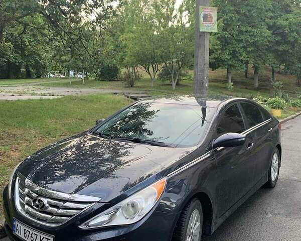 Чорний Хендай Соната, об'ємом двигуна 2.4 л та пробігом 128 тис. км за 8500 $, фото 1 на Automoto.ua