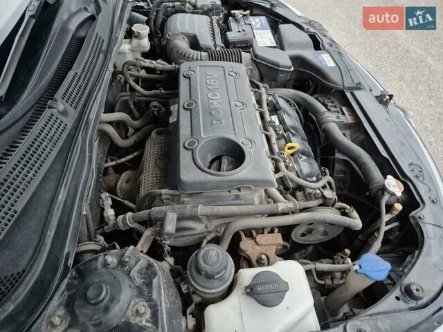 Чорний Хендай Соната, об'ємом двигуна 2.36 л та пробігом 242 тис. км за 9700 $, фото 16 на Automoto.ua