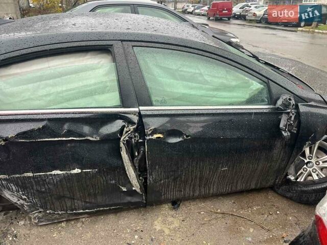 Черный Хендай Соната, объемом двигателя 2.36 л и пробегом 138 тыс. км за 1500 $, фото 1 на Automoto.ua