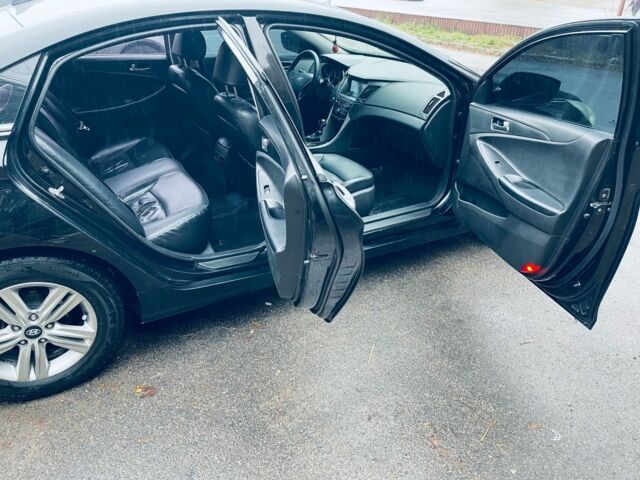 Черный Хендай Соната, объемом двигателя 2 л и пробегом 251 тыс. км за 7300 $, фото 19 на Automoto.ua