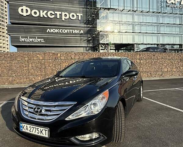 Черный Хендай Соната, объемом двигателя 2.4 л и пробегом 165 тыс. км за 10500 $, фото 1 на Automoto.ua