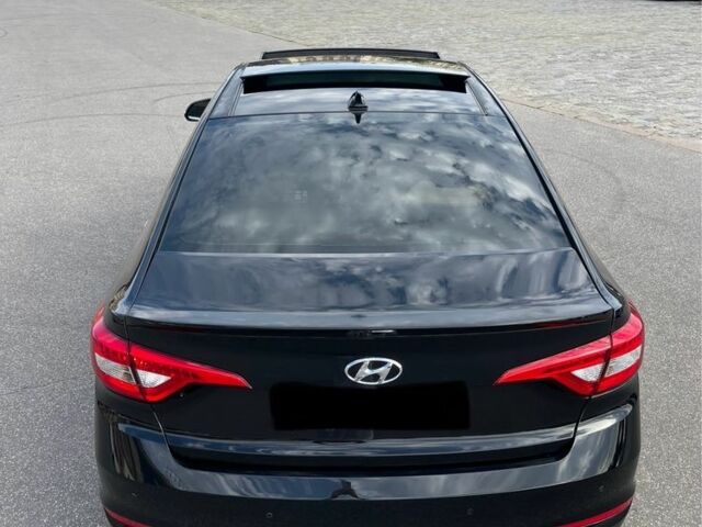 Чорний Хендай Соната, об'ємом двигуна 2 л та пробігом 127 тис. км за 12200 $, фото 1 на Automoto.ua