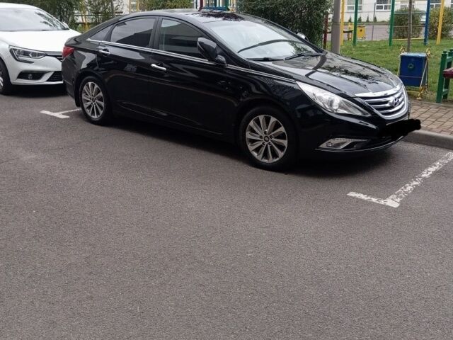 Черный Хендай Соната, объемом двигателя 2.4 л и пробегом 190 тыс. км за 10200 $, фото 1 на Automoto.ua