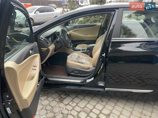 Черный Хендай Соната, объемом двигателя 2.36 л и пробегом 165 тыс. км за 10400 $, фото 8 на Automoto.ua