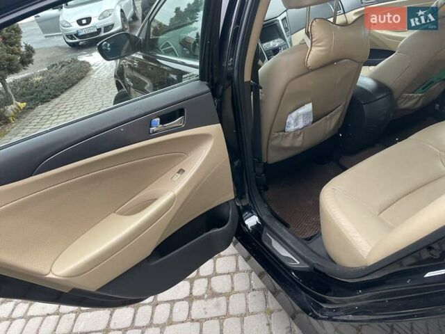 Черный Хендай Соната, объемом двигателя 2.36 л и пробегом 165 тыс. км за 10400 $, фото 11 на Automoto.ua