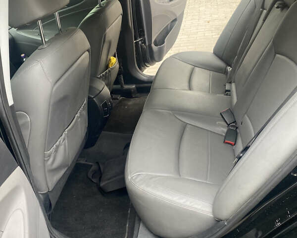 Чорний Хендай Соната, об'ємом двигуна 2.4 л та пробігом 208 тис. км за 11700 $, фото 4 на Automoto.ua