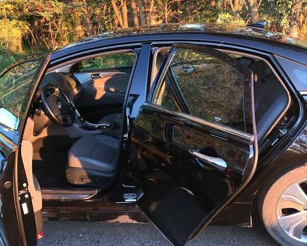 Чорний Хендай Соната, об'ємом двигуна 2.4 л та пробігом 129 тис. км за 13000 $, фото 4 на Automoto.ua