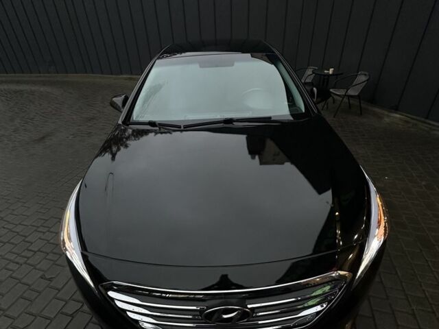 Черный Хендай Соната, объемом двигателя 2.4 л и пробегом 300 тыс. км за 9000 $, фото 1 на Automoto.ua