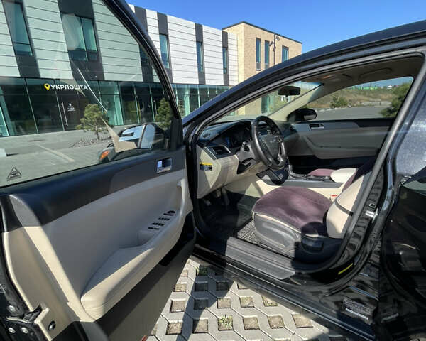 Чорний Хендай Соната, об'ємом двигуна 2.36 л та пробігом 135 тис. км за 10800 $, фото 11 на Automoto.ua