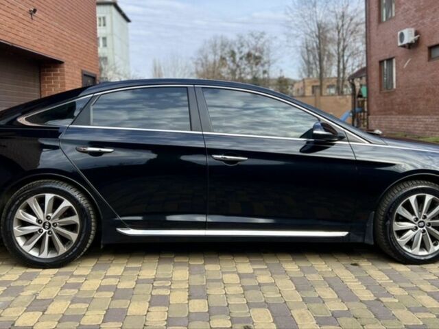 Черный Хендай Соната, объемом двигателя 2.4 л и пробегом 150 тыс. км за 12000 $, фото 1 на Automoto.ua