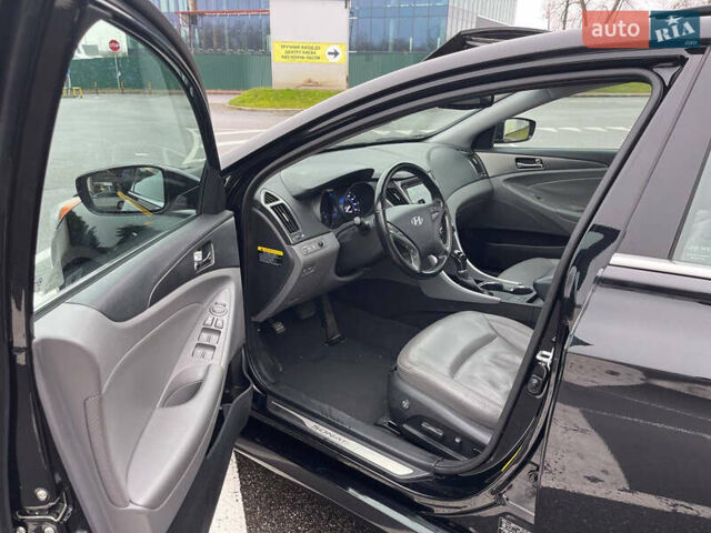 Черный Хендай Соната, объемом двигателя 2.36 л и пробегом 113 тыс. км за 12777 $, фото 4 на Automoto.ua