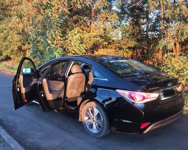 Чорний Хендай Соната, об'ємом двигуна 2.4 л та пробігом 129 тис. км за 13000 $, фото 3 на Automoto.ua