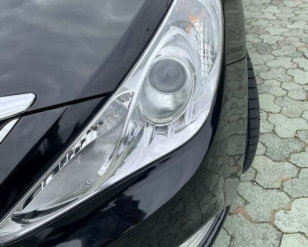 Черный Хендай Соната, объемом двигателя 2 л и пробегом 190 тыс. км за 7600 $, фото 1 на Automoto.ua