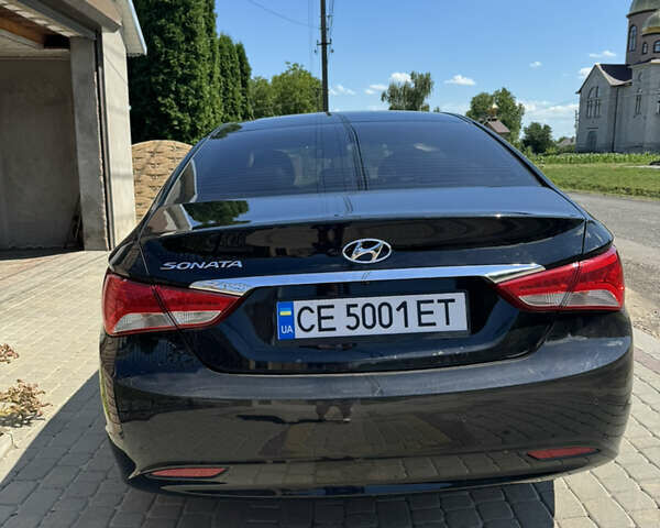 Чорний Хендай Соната, об'ємом двигуна 2.36 л та пробігом 149 тис. км за 14000 $, фото 3 на Automoto.ua