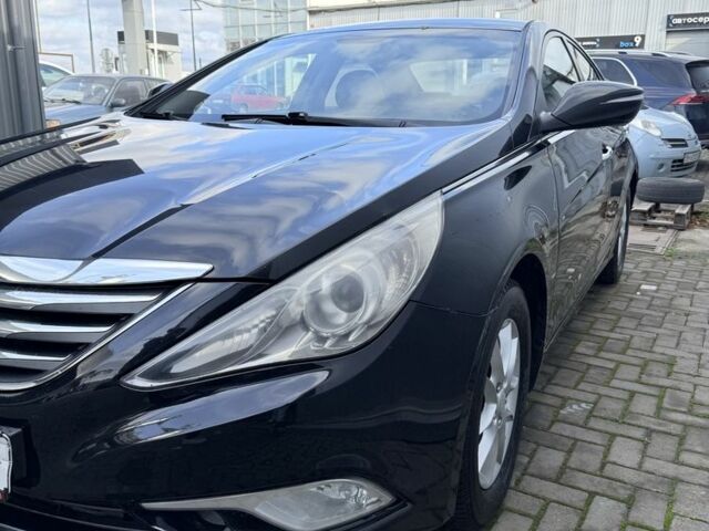 Черный Хендай Соната, объемом двигателя 2 л и пробегом 220 тыс. км за 7599 $, фото 1 на Automoto.ua