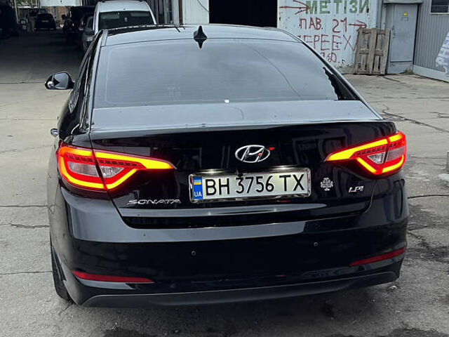 Черный Хендай Соната, объемом двигателя 2 л и пробегом 197 тыс. км за 13500 $, фото 1 на Automoto.ua