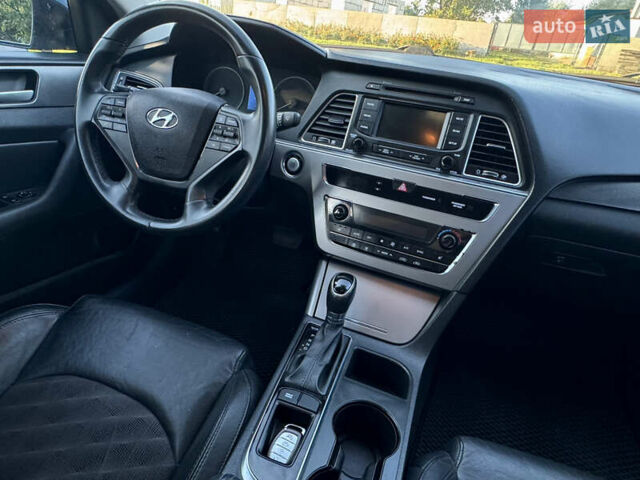 Черный Хендай Соната, объемом двигателя 2.36 л и пробегом 129 тыс. км за 11350 $, фото 13 на Automoto.ua