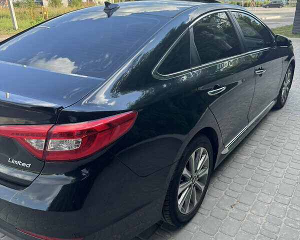 Чорний Хендай Соната, об'ємом двигуна 2.36 л та пробігом 130 тис. км за 10999 $, фото 9 на Automoto.ua