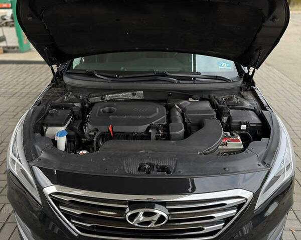 Чорний Хендай Соната, об'ємом двигуна 2.36 л та пробігом 145 тис. км за 9799 $, фото 34 на Automoto.ua