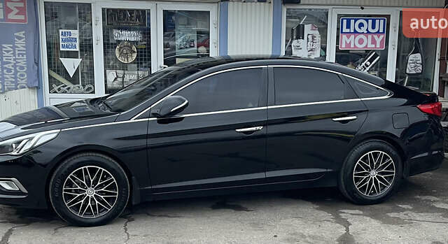 Черный Хендай Соната, объемом двигателя 2 л и пробегом 197 тыс. км за 13500 $, фото 2 на Automoto.ua