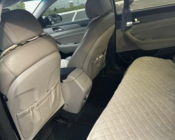 Черный Хендай Соната, объемом двигателя 2.36 л и пробегом 141 тыс. км за 10200 $, фото 11 на Automoto.ua