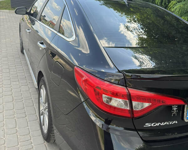 Чорний Хендай Соната, об'ємом двигуна 2.36 л та пробігом 130 тис. км за 10999 $, фото 7 на Automoto.ua