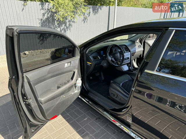 Черный Хендай Соната, объемом двигателя 2.36 л и пробегом 130 тыс. км за 10500 $, фото 12 на Automoto.ua